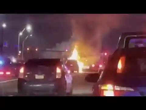 Car catches fire after crash with semi in Orlando