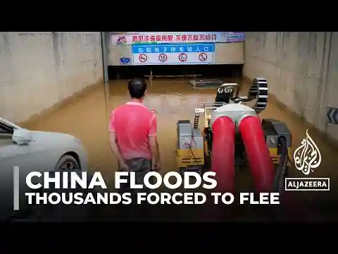China floods: Tens of thousands forced to flee rising water