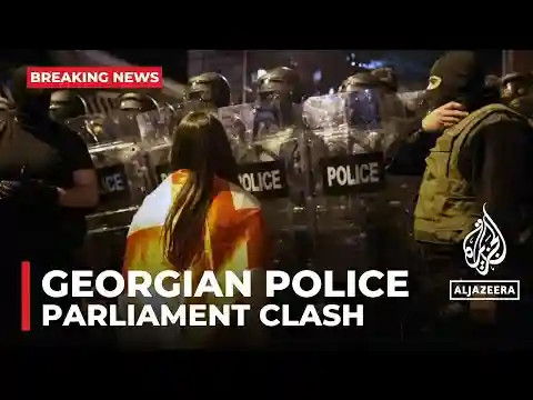 Georgian police fire tear gas and water cannons at protesters outside Parliament building