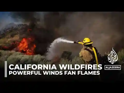 Wildfires spread across California as strong winds fan flames, forcing evacuations
