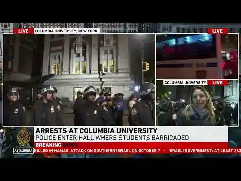 Lines of police in riot gear enter Columbia University campus
