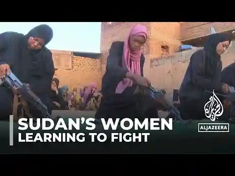 Sudan’s women attend training camps to learn how to fight