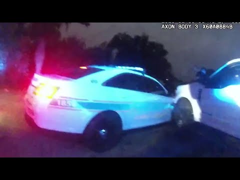 Bodycam footage shows moment man crashing into police vehicle during carjacking pursuit in Centr...