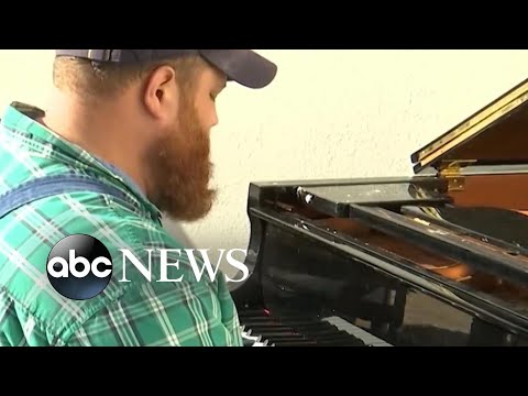 Kentucky man plays piano amid tornado destruction