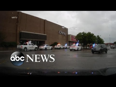 Police applaud armed man who killed mall gunman
