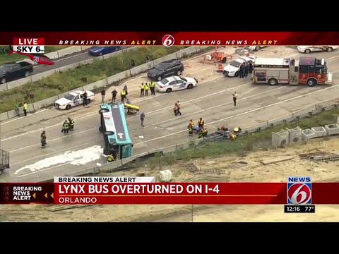 Breaking news coverage: Bus overturns on I-4