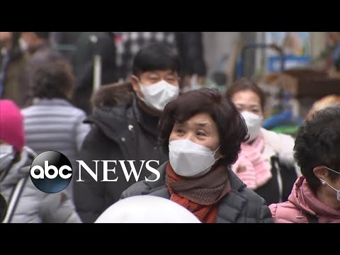 Concerns grow over virus spreading as new hot zone identified in South Korea